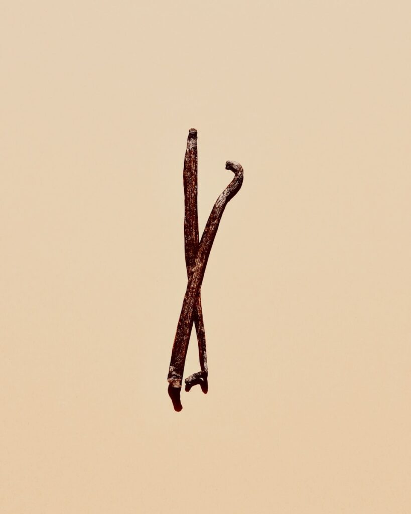 brown stick on yellow background